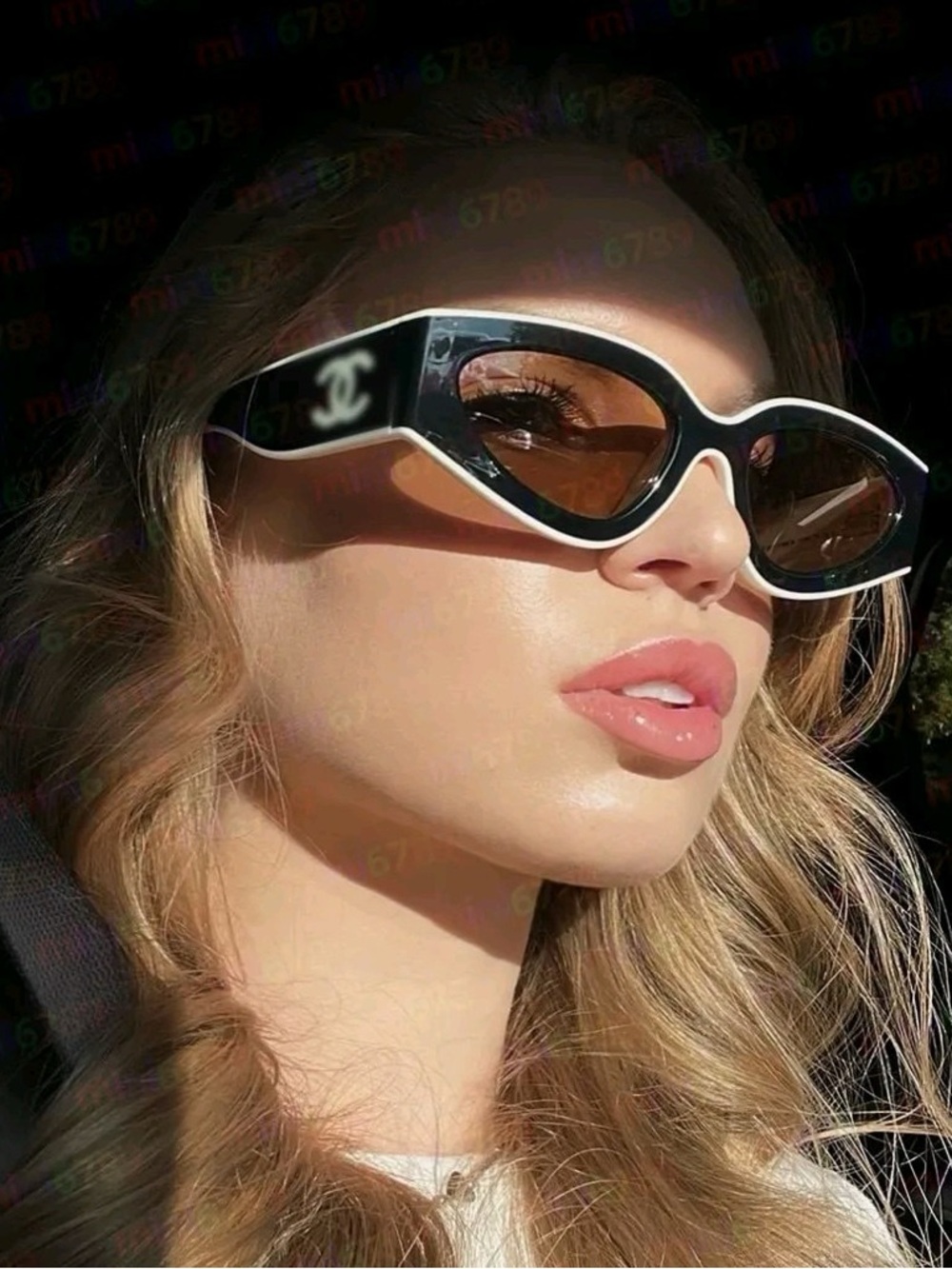 Black and White Cat-Eye Sunglasses with Brown Lenses